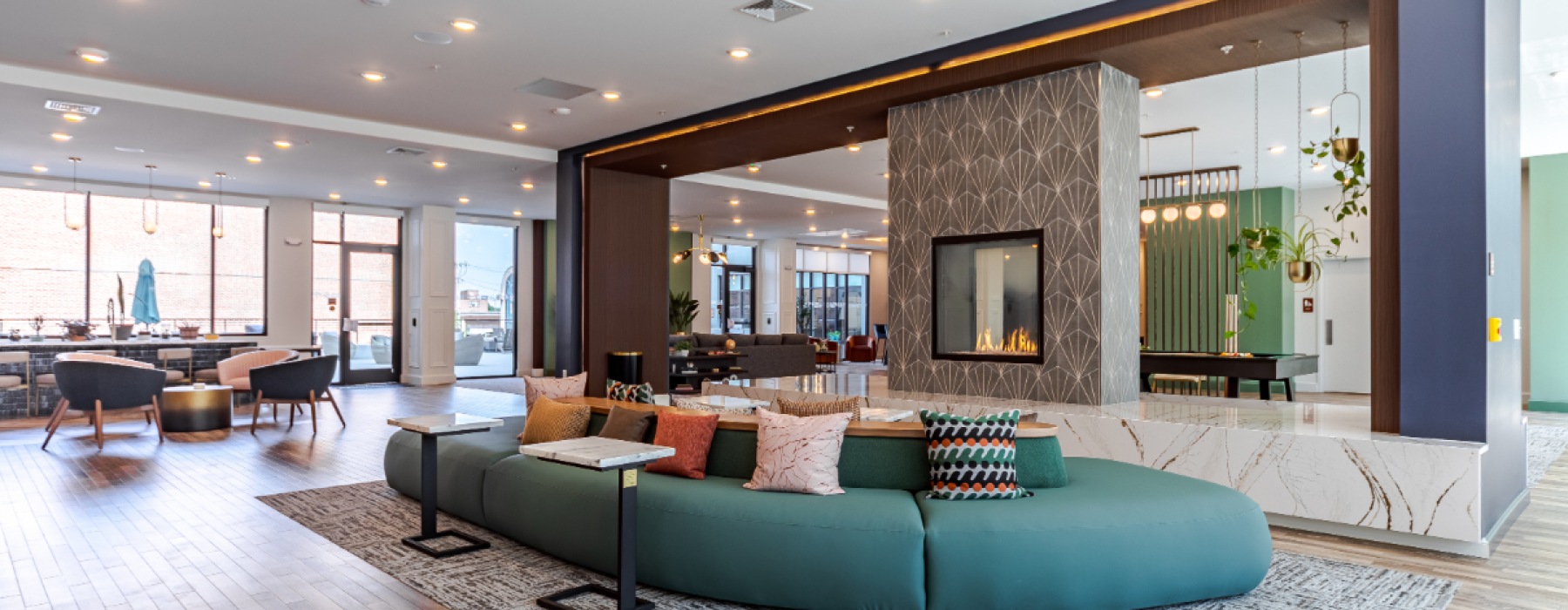 swanky lounge seating in front of a fire place