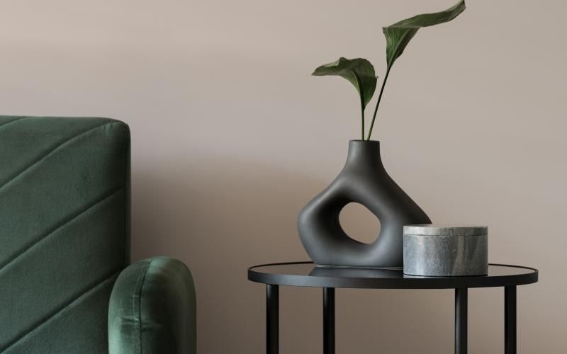 a vase with a plant in it